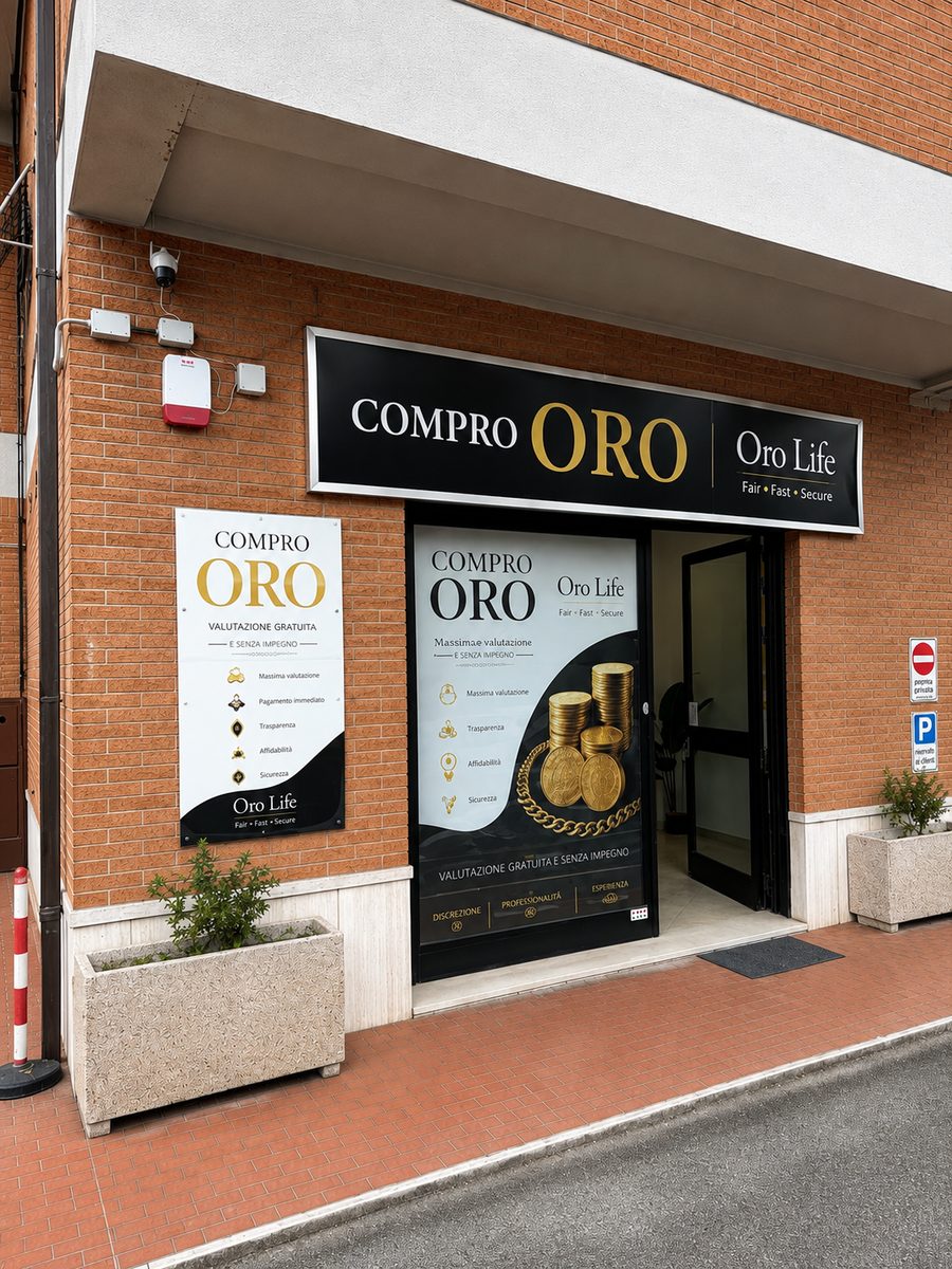 Vetrina Oro Life Bastia Umbra in Via Roma 106, con insegna Compro Oro